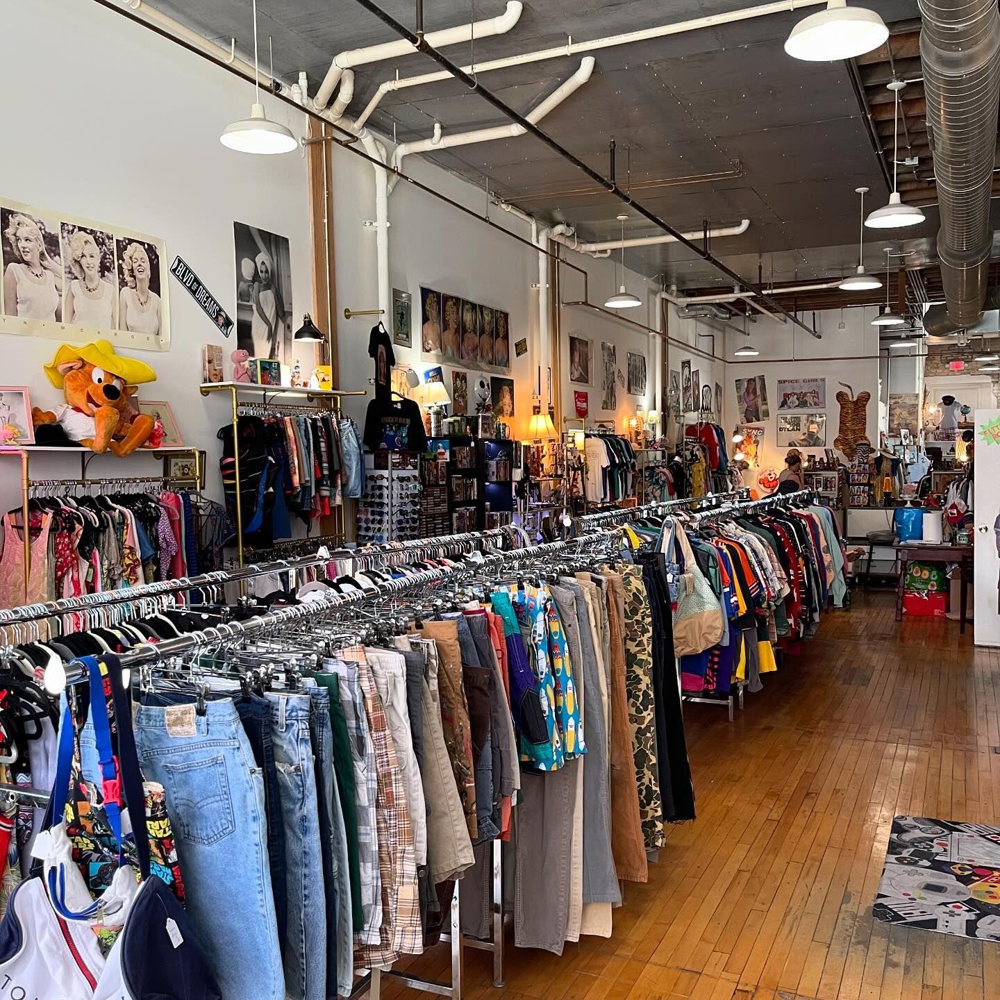 Interior shot of Decaydence Vintage store racks and vintage décor