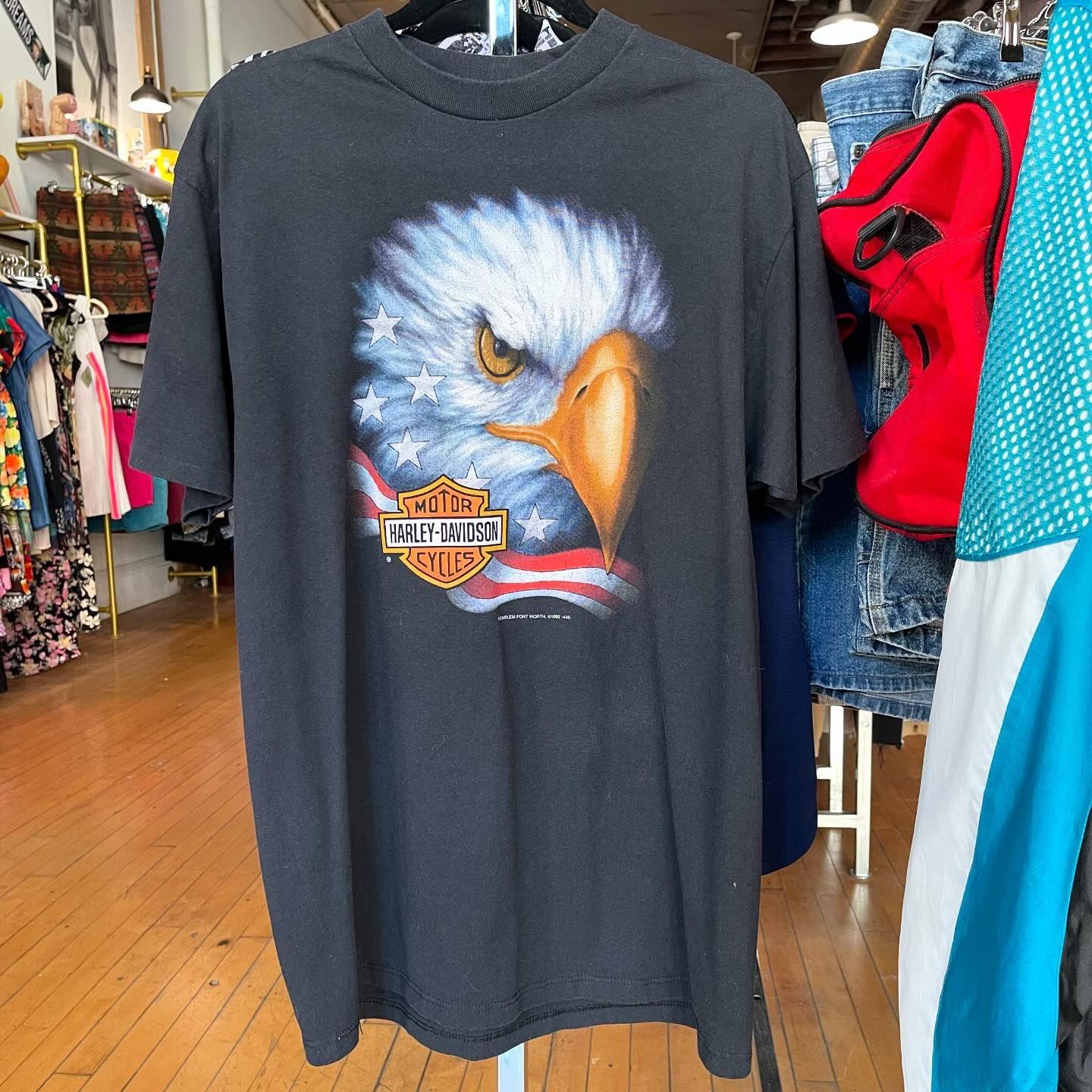 Vintage Harley-Davidson eagle t-shirt hanging in store
